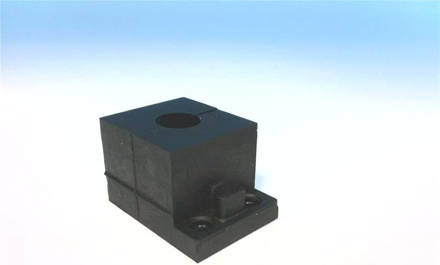 a black square component with a hole on top and a small protrusion on the side